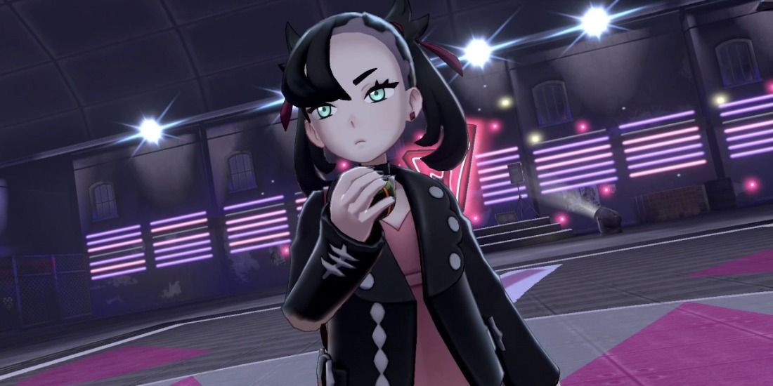 Marnie ready for battle with a Dusk Ball in Pokemon Sword & Shield