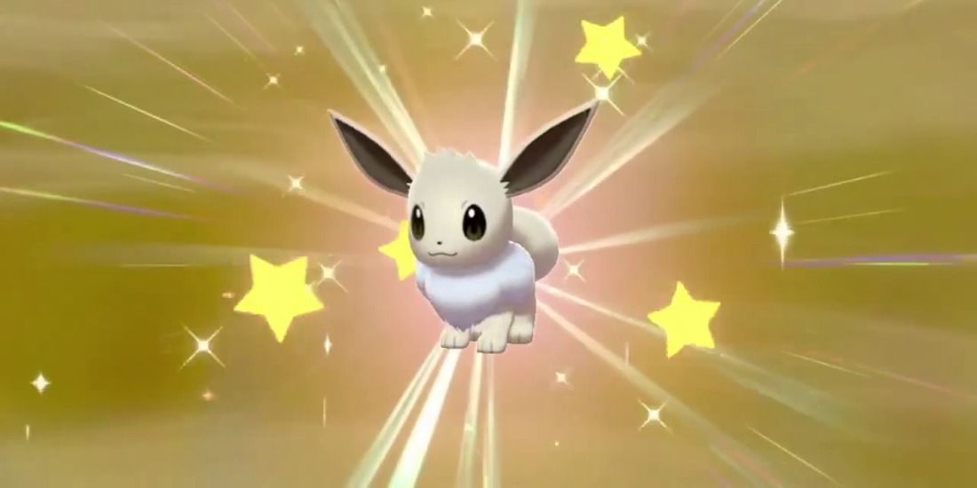 A Shiny Eevee hatching from an egg in Pokemon Sword & Shield.