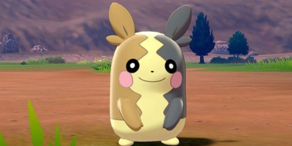 Morpeko stands on a dirt path by some grass