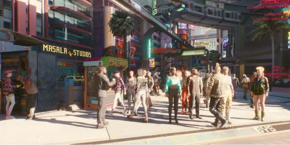Cyberpunk 2077 Pedestrians Next To Strip Mall On Sidewalk