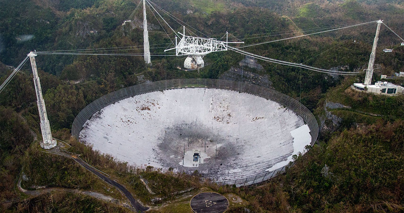 Image with public domain license of the Arecibo telescope via Sciencemag.org.