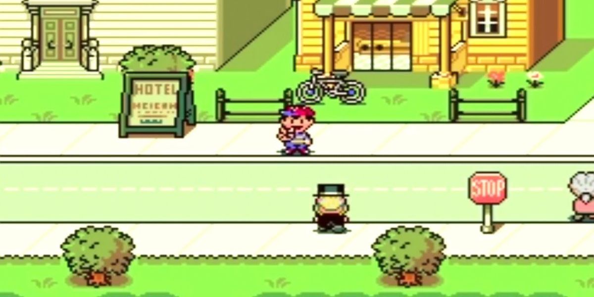 Ness smiles and throws up the peace sign in Earthbound