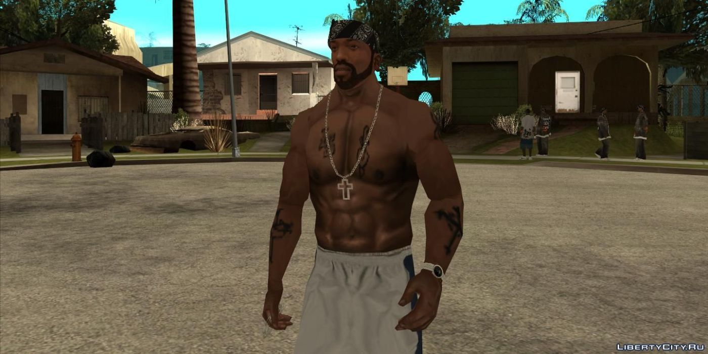 A buff, tatted up CJ stands in the middle of Grove Street in GTA SA