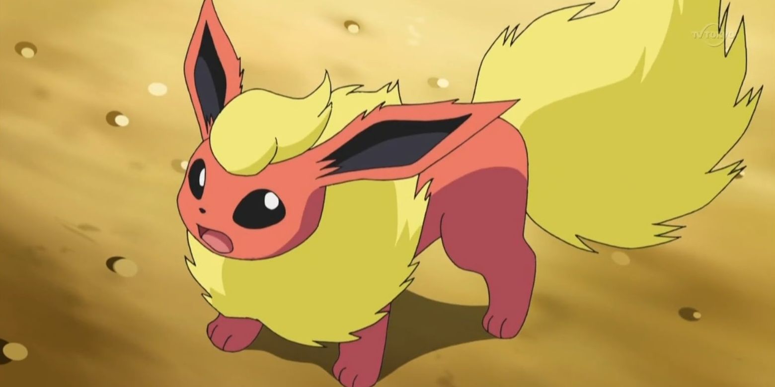 A frightened Flareon from the Pokemon Anime on a dirt stadium