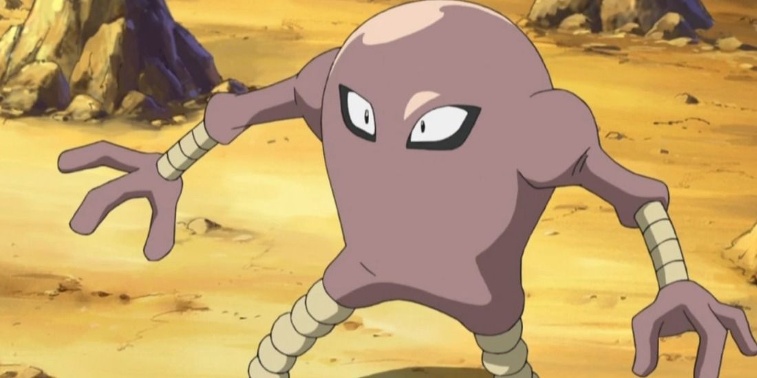 Hitmonlee looking frightened at an opponent in the Pokemon anime