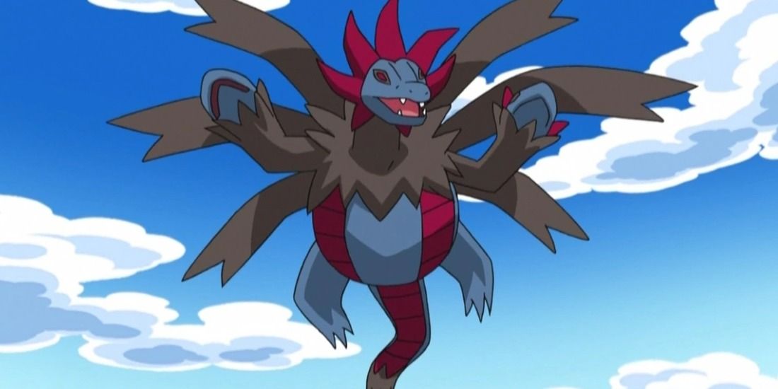 Hydreigon floating in the blue sky in the Pokemon anime