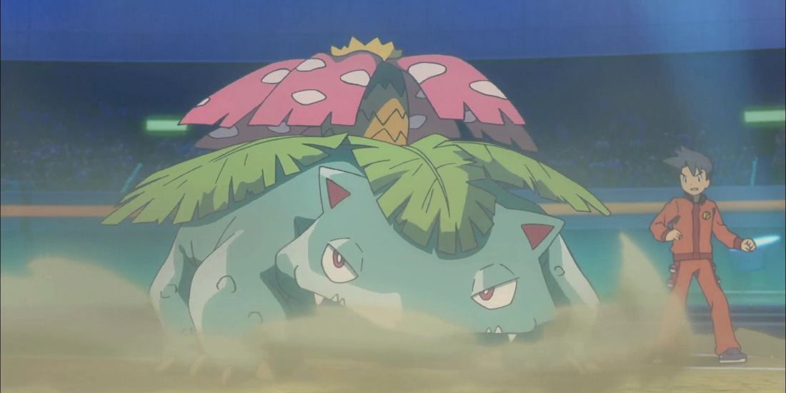 Venusaur sliding in a battle stadium from the Pokemon Anime