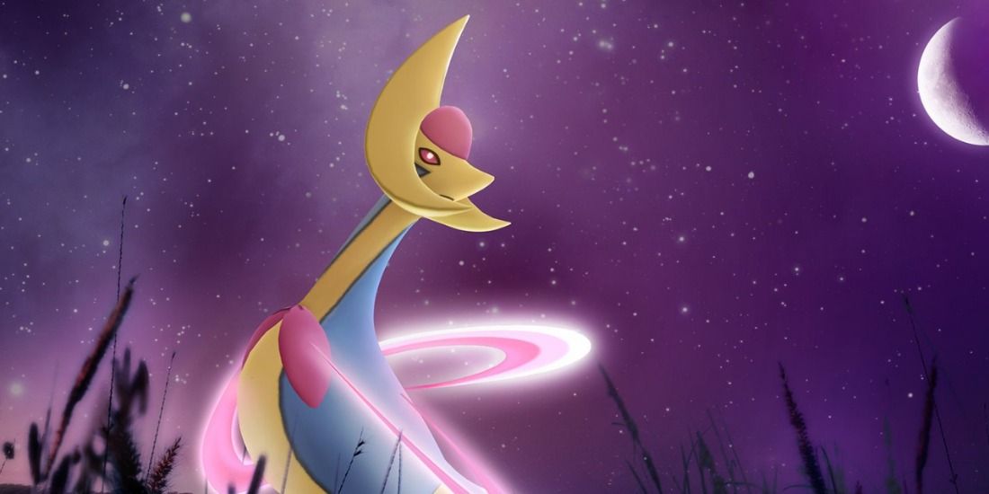 Cresselia looking at the moon at night in Pokemon Go