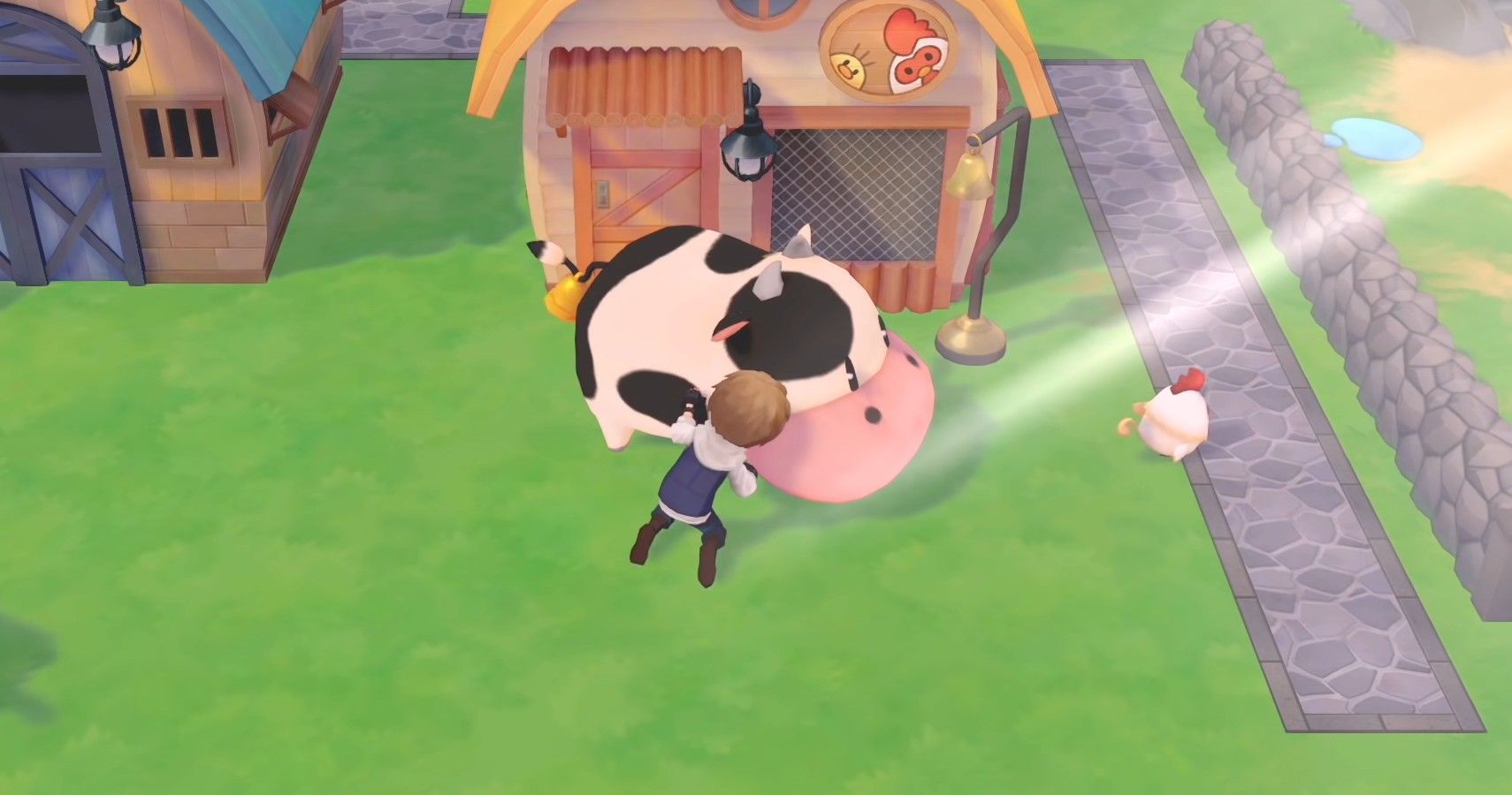 A screenshot of the Story of Seasons: Pioneers of Olive Town protagonist taking care of a cow