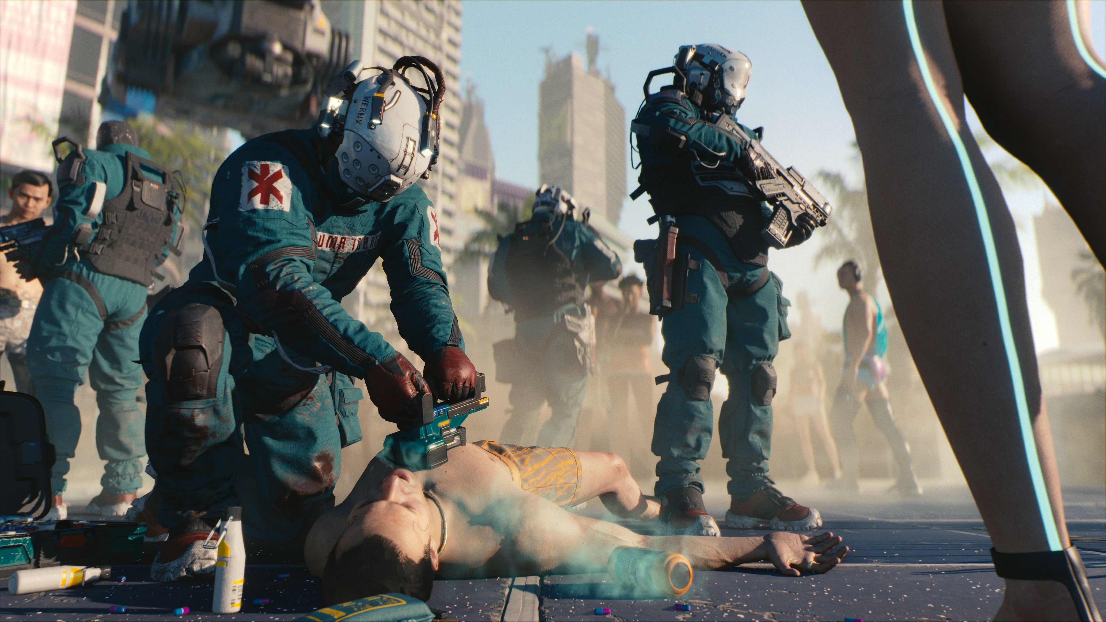 A screenshot from Cyberpunk 2077. A medical team stands around a man on the ground who is being ressucitated.