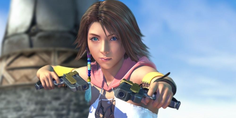 Yuna holding up a gun to the camera in Final Fantasy X-2