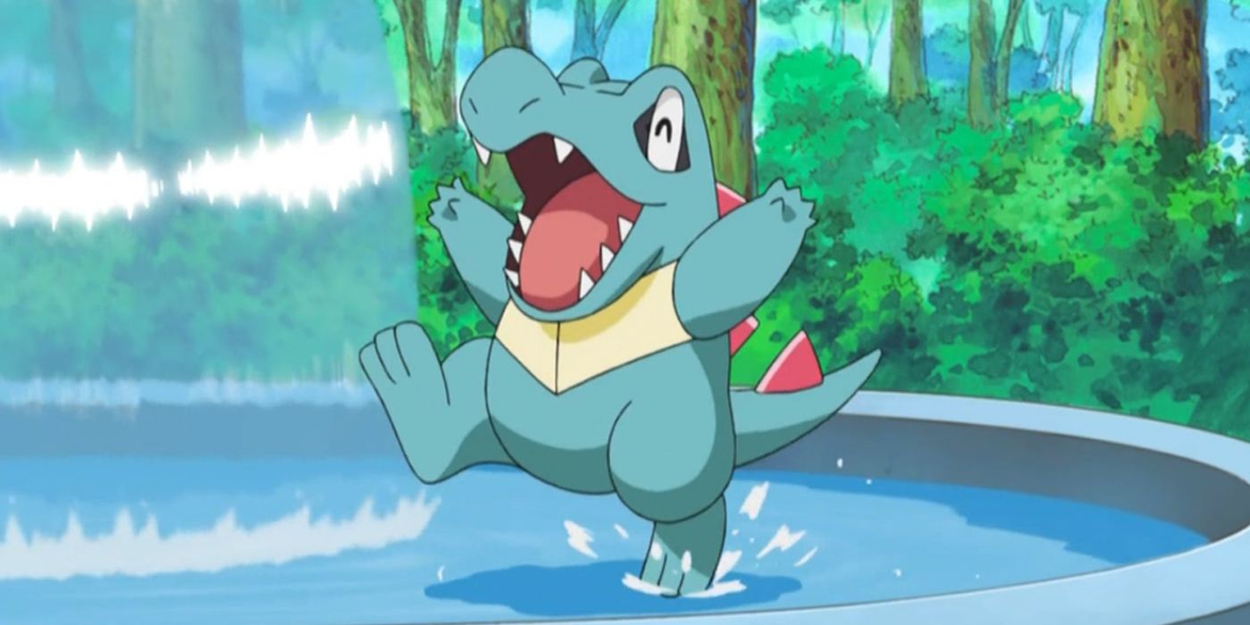 totodile playing in a river