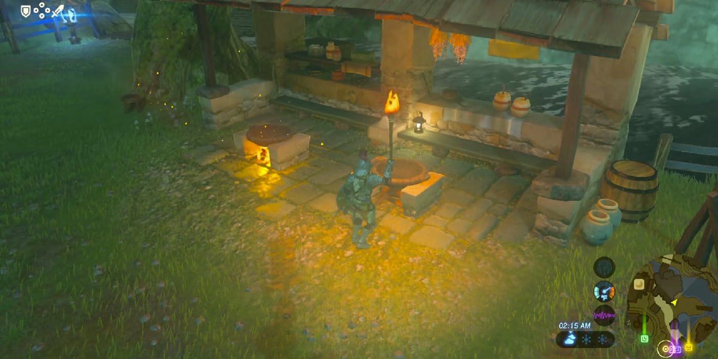 Link prepares to lit a fire at night