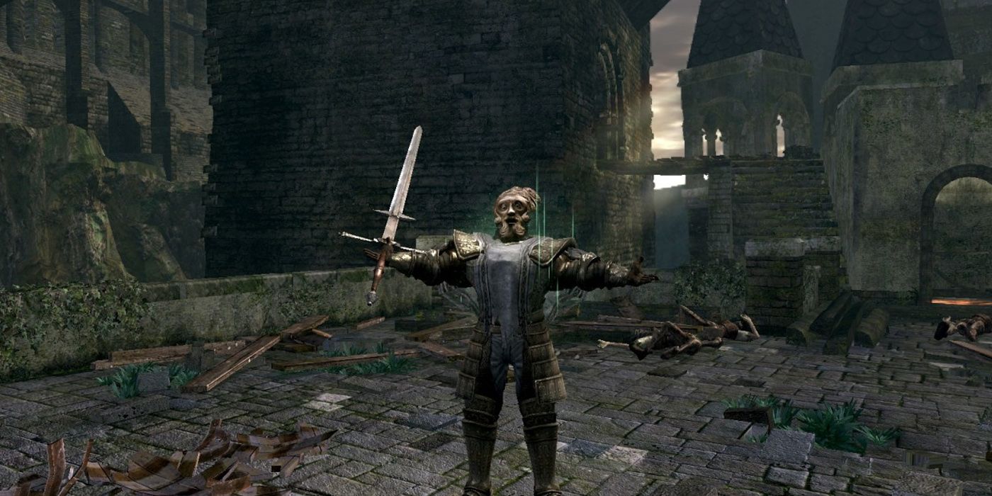 A Chosen Undead dressed as a Giant Dad holds out their arms with sword in-hand.