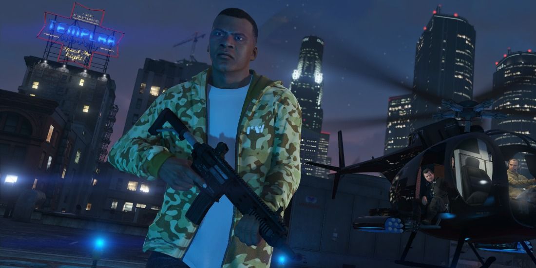 Characters on a helipad at night in the city from Grand Theft Auto 5