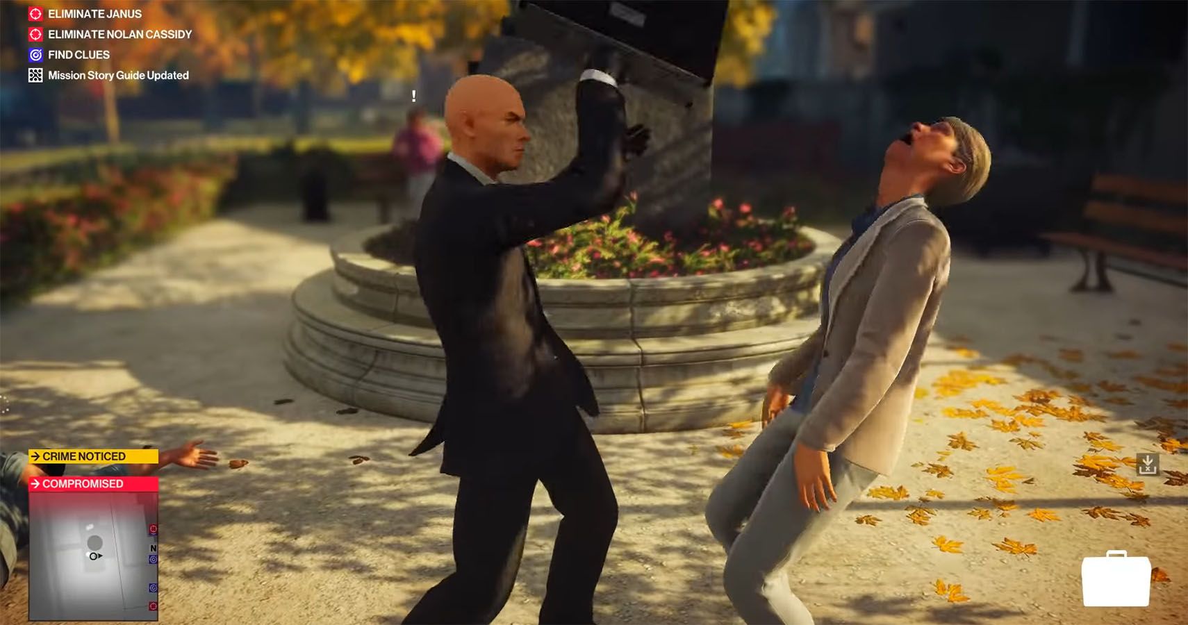 Screenshot of someone using Agent 47's briefcase to get a kill in Hitman 2