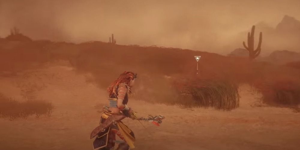 Horizon Zero Dawn Aloy wearing the Carja Blazon Armor in a sandstorm