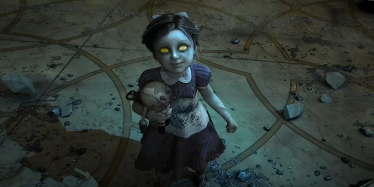 A little sister looks up at the camera in Bioshock