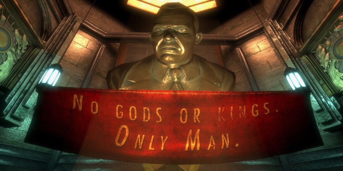 A screenshot of the banner that says "No Gods or Kings, Only Man" in front of the bust of Andrew Ryan in Bioshock
