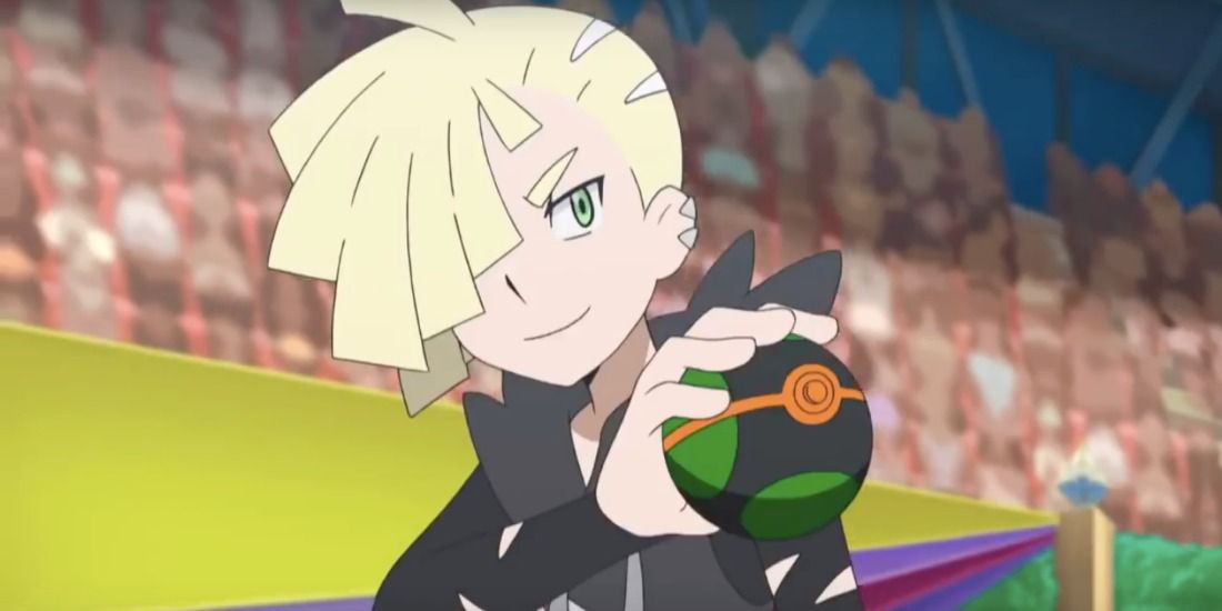 Gladion holding a Dusk Ball from the Pokemon anime
