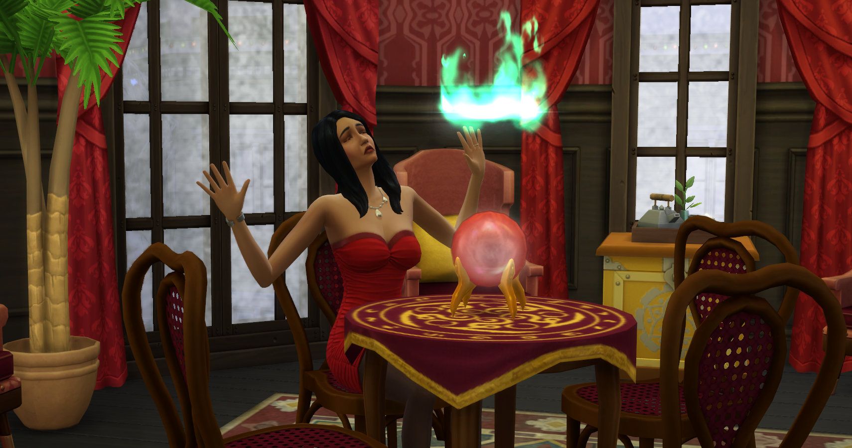 Bella Goth using a seance table in her home.