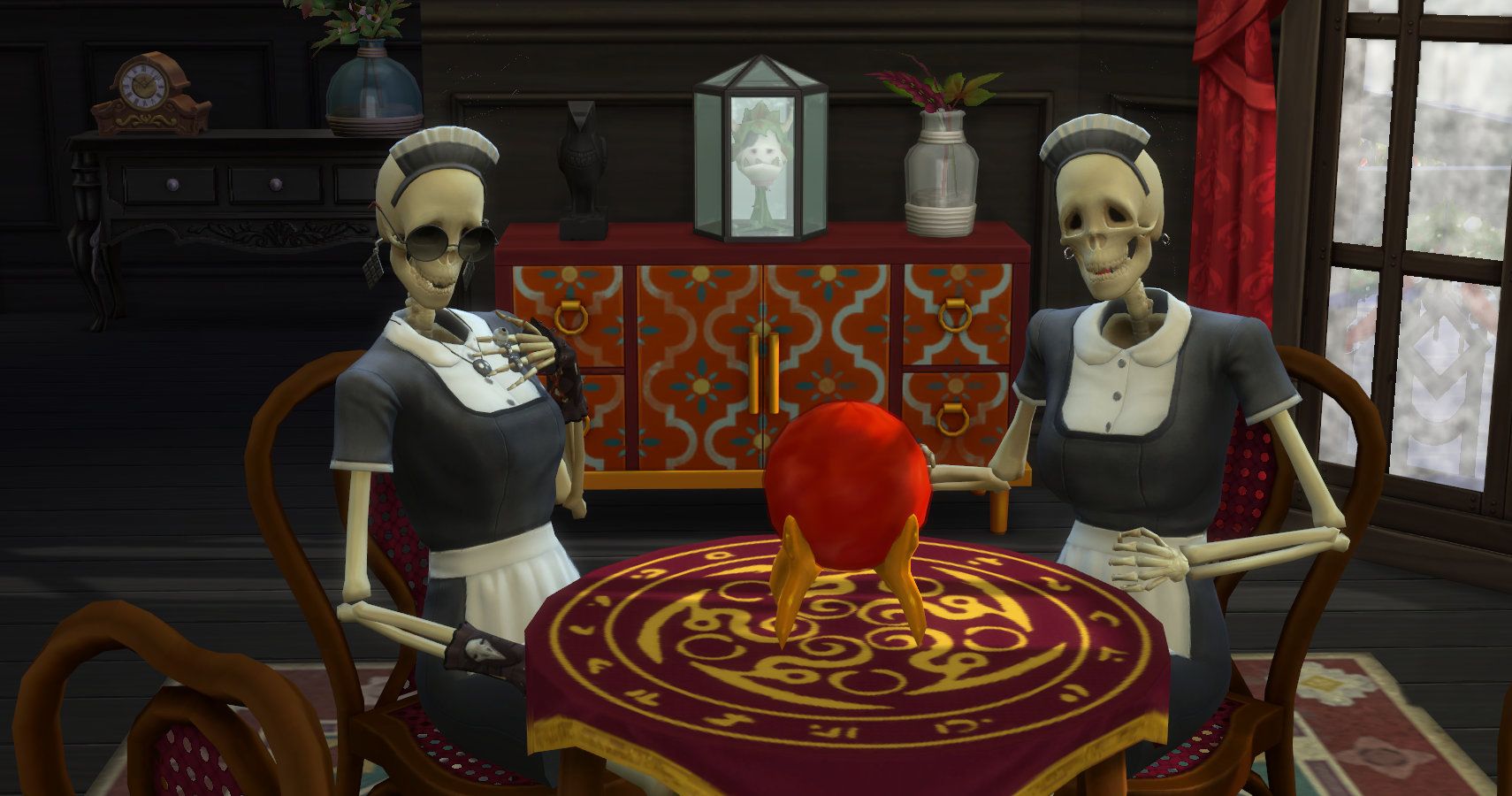 Bonehilda and Bella goth as bonehilda sat at a seance table.