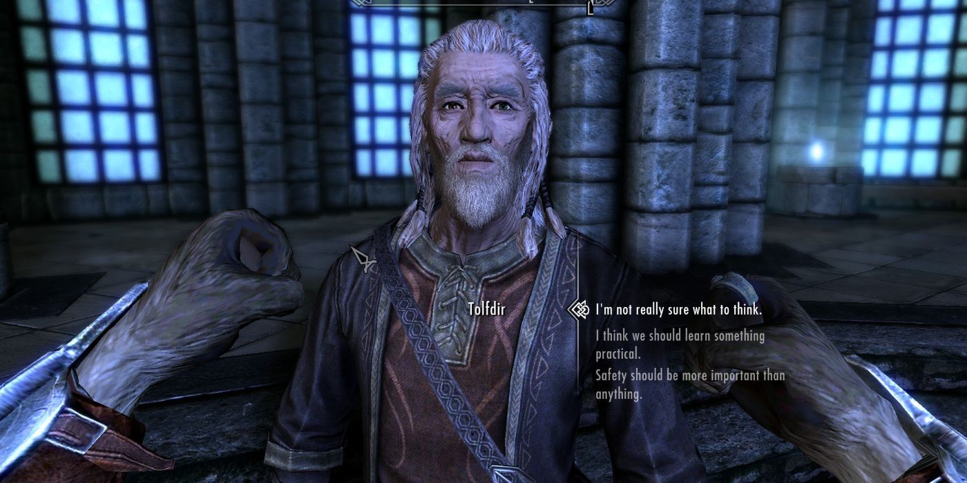 Alteration Mage and Trainer Tolfdir, speaking to players in the main hall of the College of Winterhold