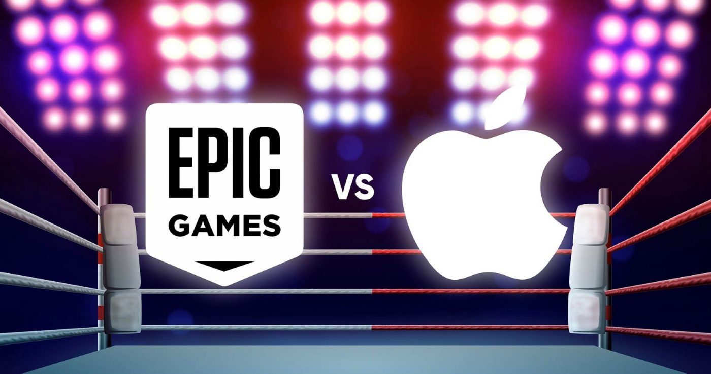 the epic and apple logos in a boxing ring