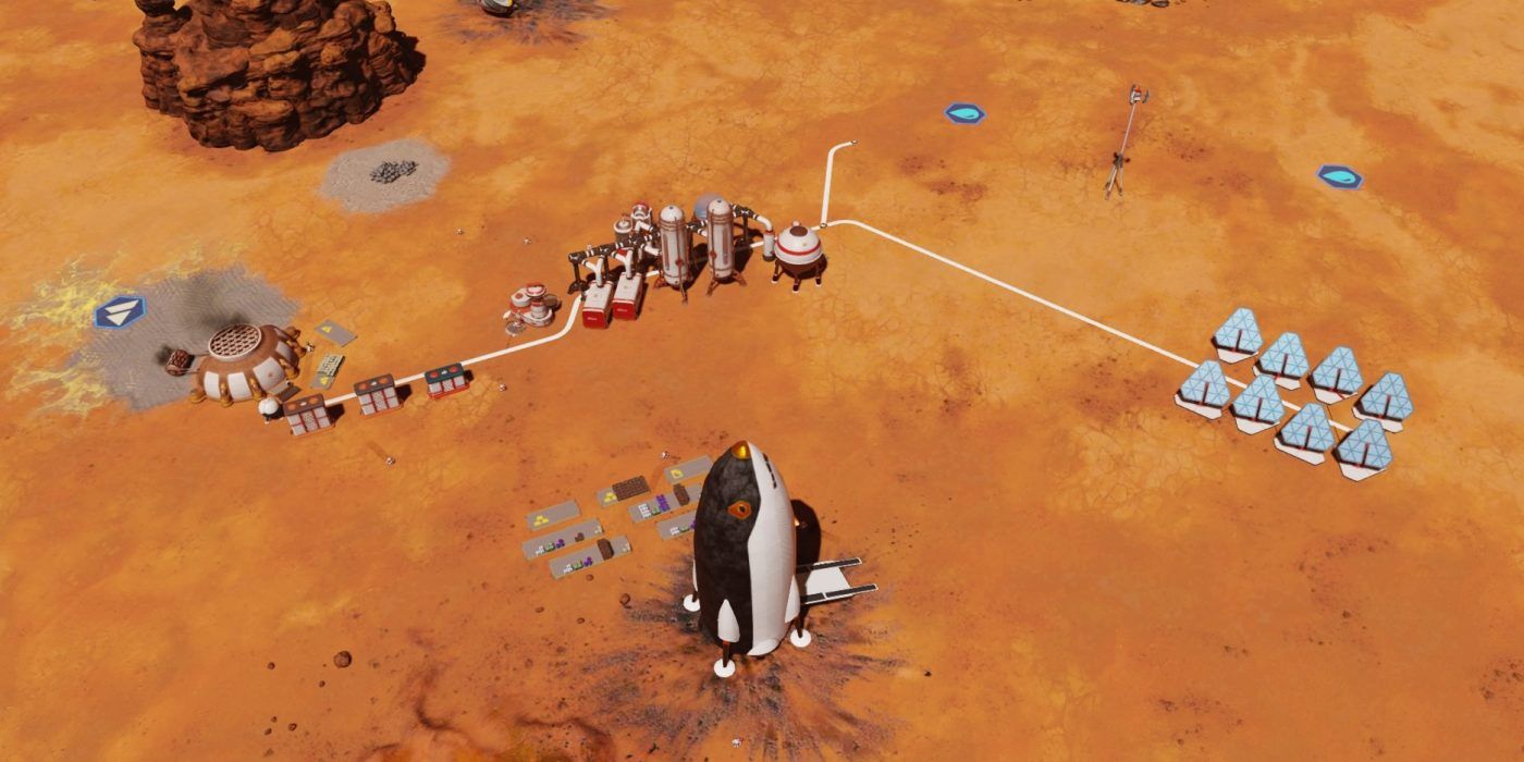 an example of a very early colony in surviving mars, consisting of a rocket, some solar panels, and a concrete extractor