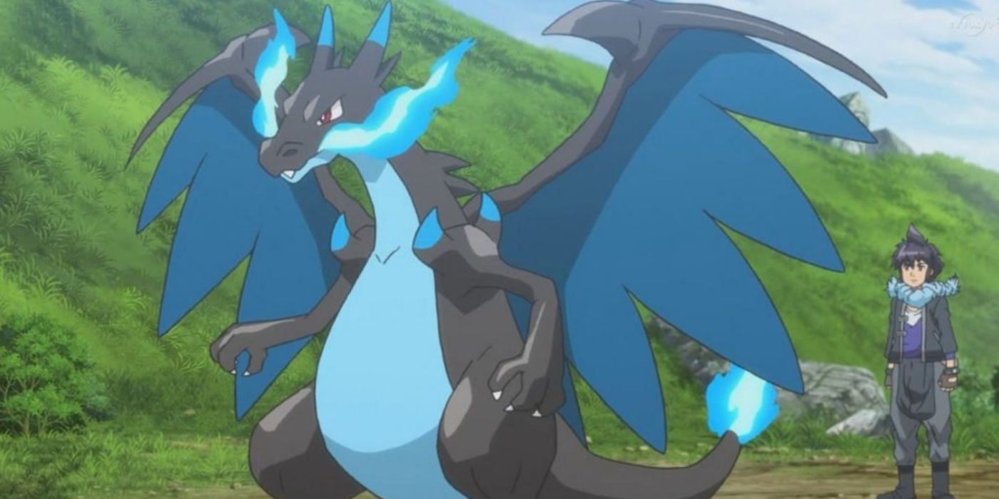 Mega Charizard X out on the field in front of Alain