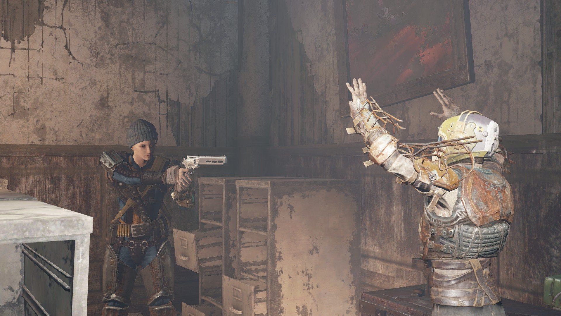 A character pointing a gun at another character, who is holding their hands in the air.