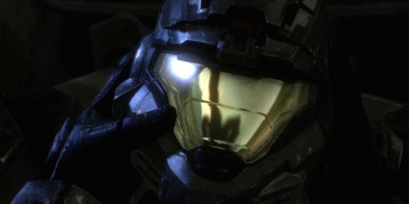 Noble 6 holding and looking at their helmet in Halo: Reach's intro