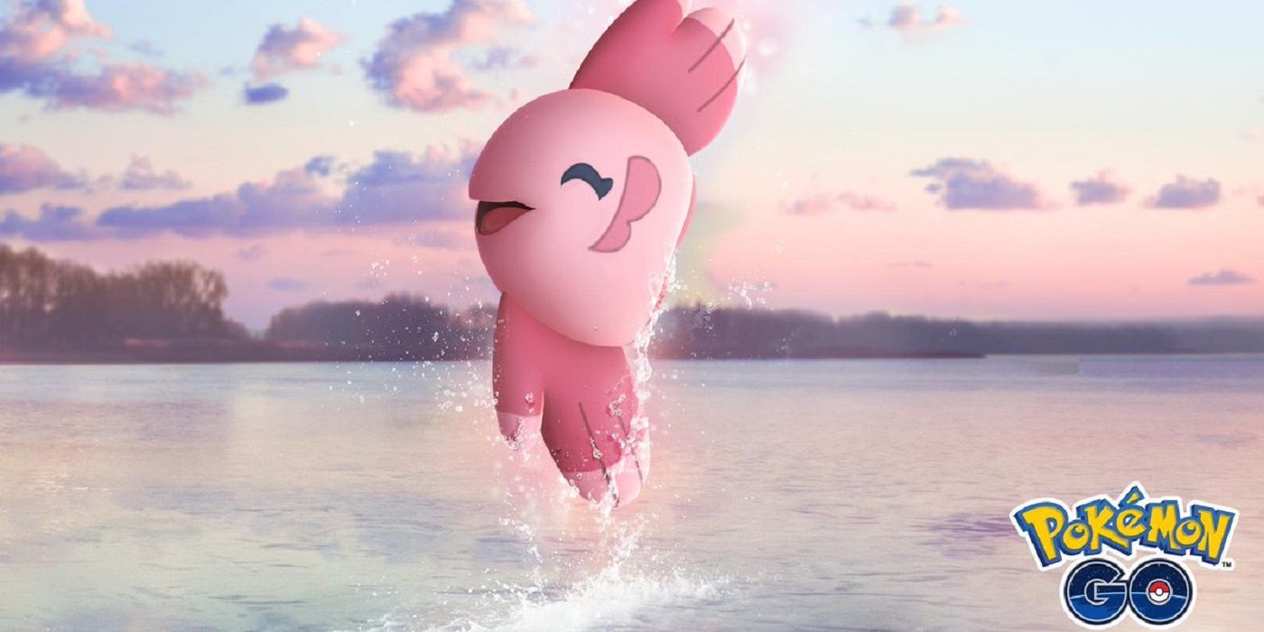 Pokemon GO Smiling Alomomola leaping out of water during sunset