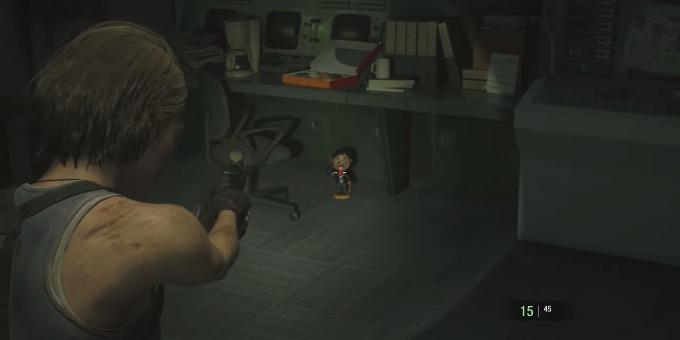 Resident Evil 3 Screenshot Of Charlie Doll Under Desk