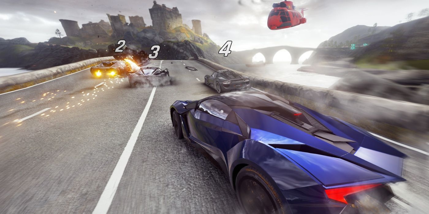 Blue car racing against rivals near castle in Asphalt 9 Legends.