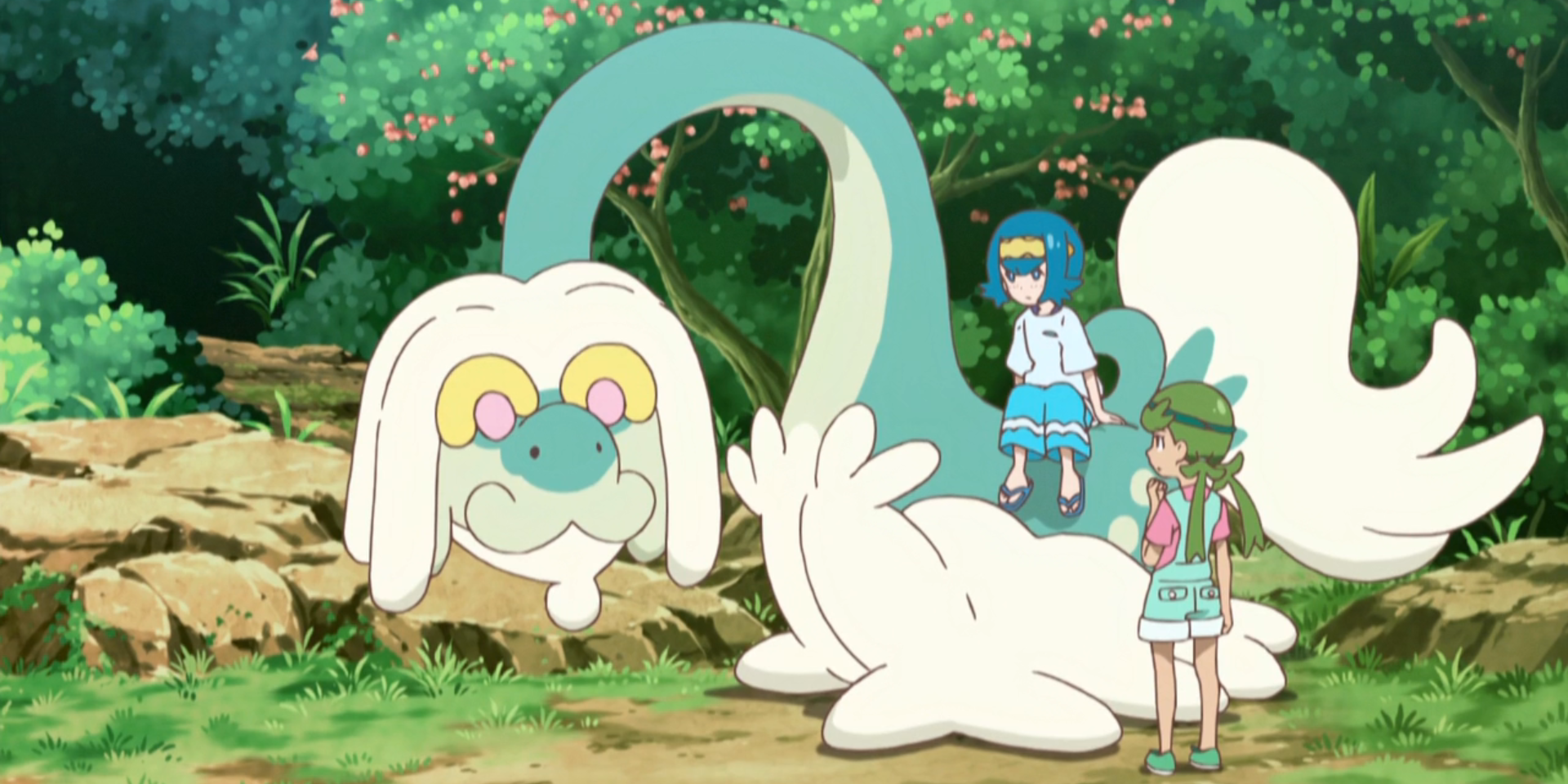 The Pokemon Drampa along with young trainers keeping it company