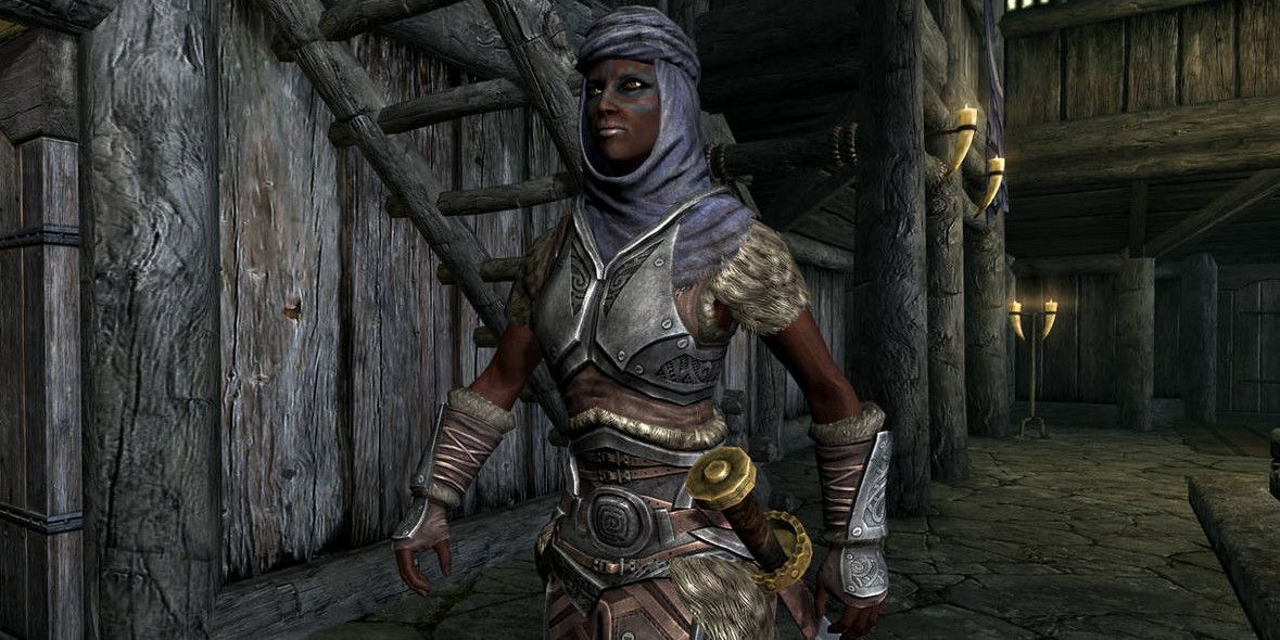 rayya standing with her scimitar at her side