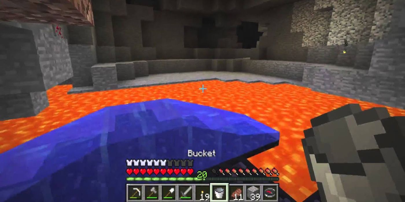 Minecraft Screenshot Of Bucket Pouring Water and Lava