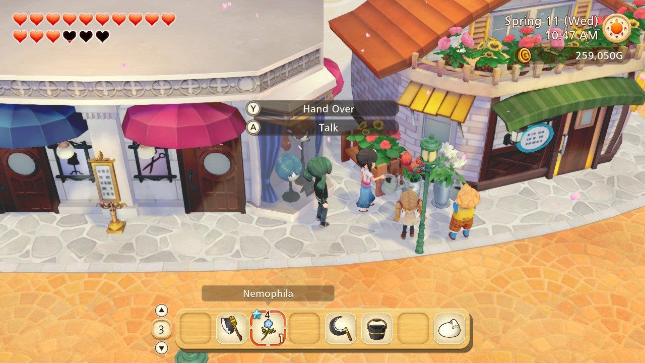 Story of Seasons Pioneers of Olive Town Linh watering flowers outside the flower shop
