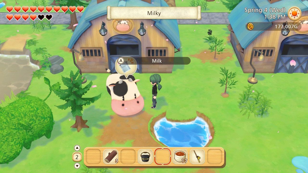 Story of Seasons Pioneers of Olive Town cow that needs to be milked outside a barn
