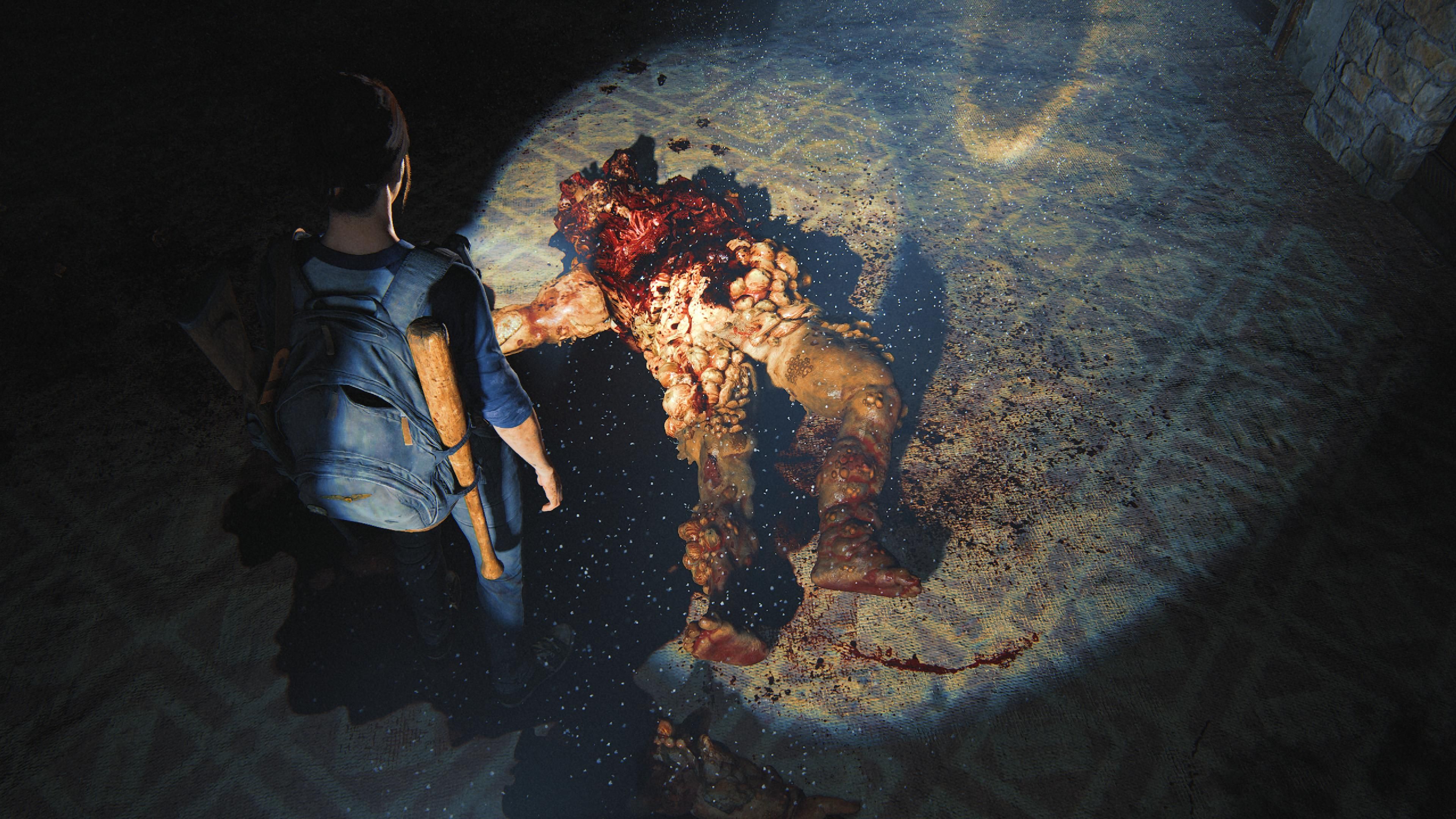 Ellie standing over a dead Bloater The Last Of Us Part 2