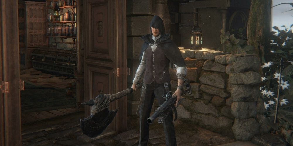 bloodborne hunter with hunter axe and blunderbuss
