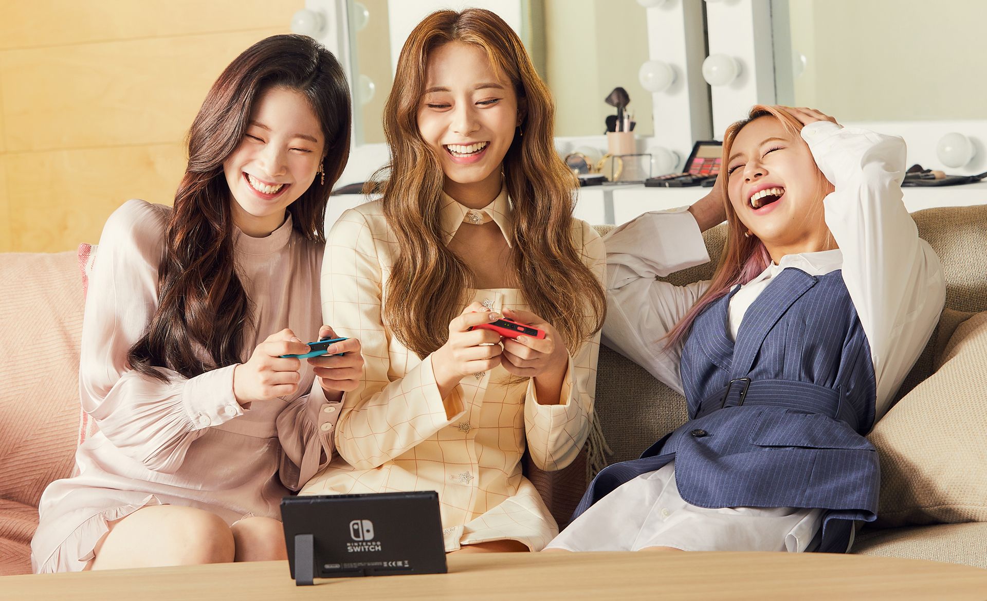 3 members of TWICE playing on the Nintendo Switch