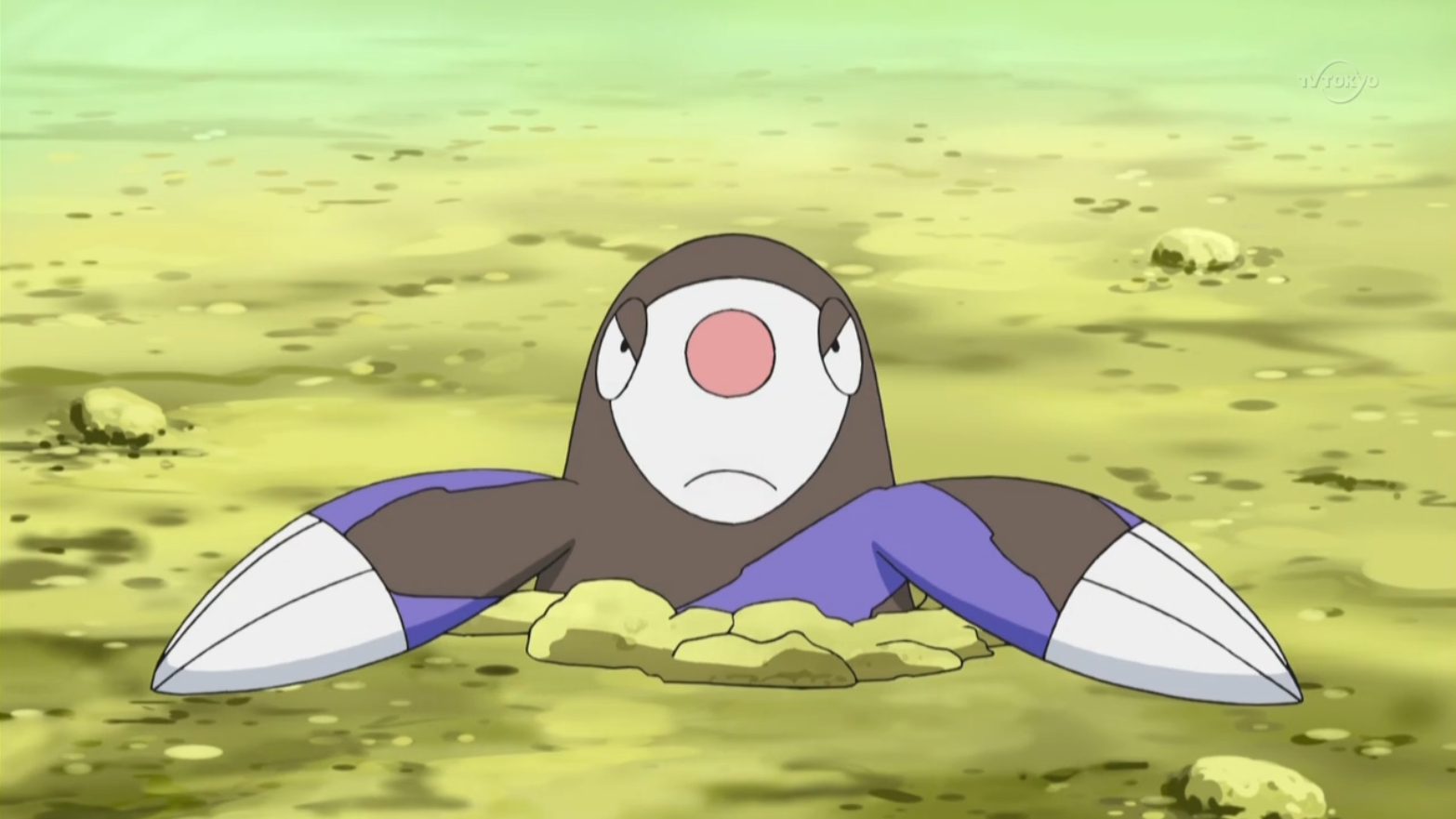 drilbur poking out of the ground and frowning in the pokemon anime