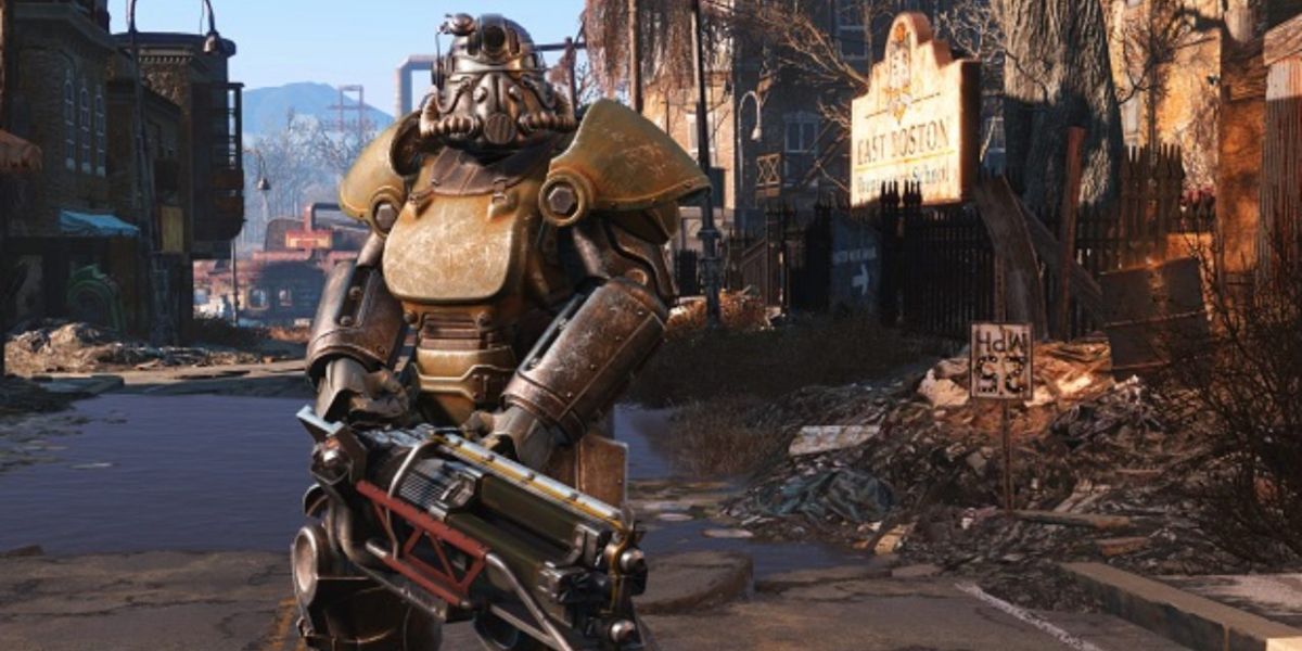 A player equipped with a full power armor and a heavy assault weapon.