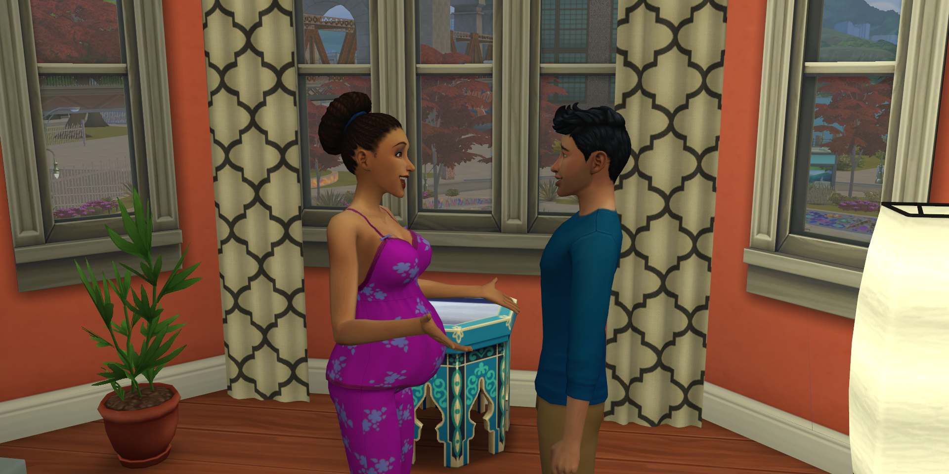Arun and Jasmeen Bheeda talk in their Sims 4 apartment