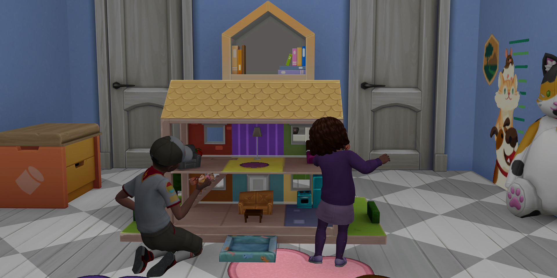 A child and toddler playing with a dollhouse together