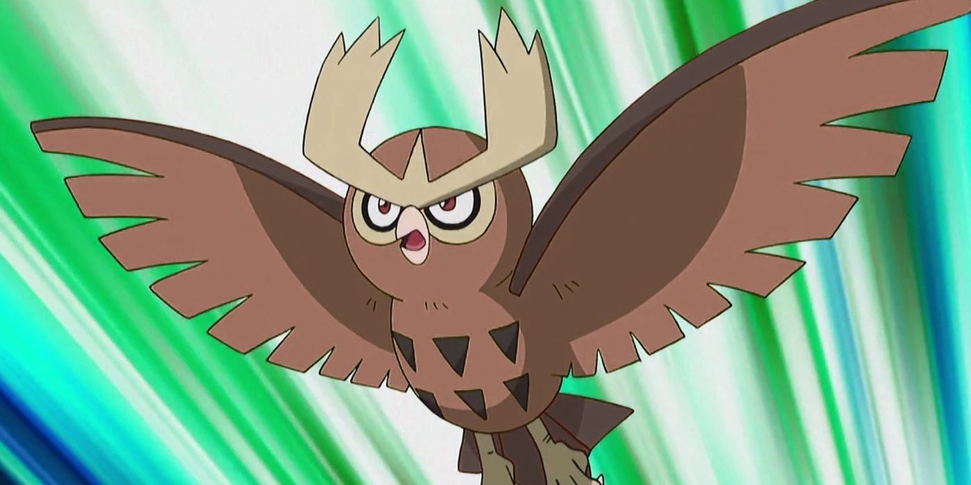 a noctowl with its wings spread wide in flight