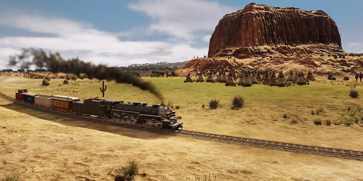 Railway Empire train driving through desert