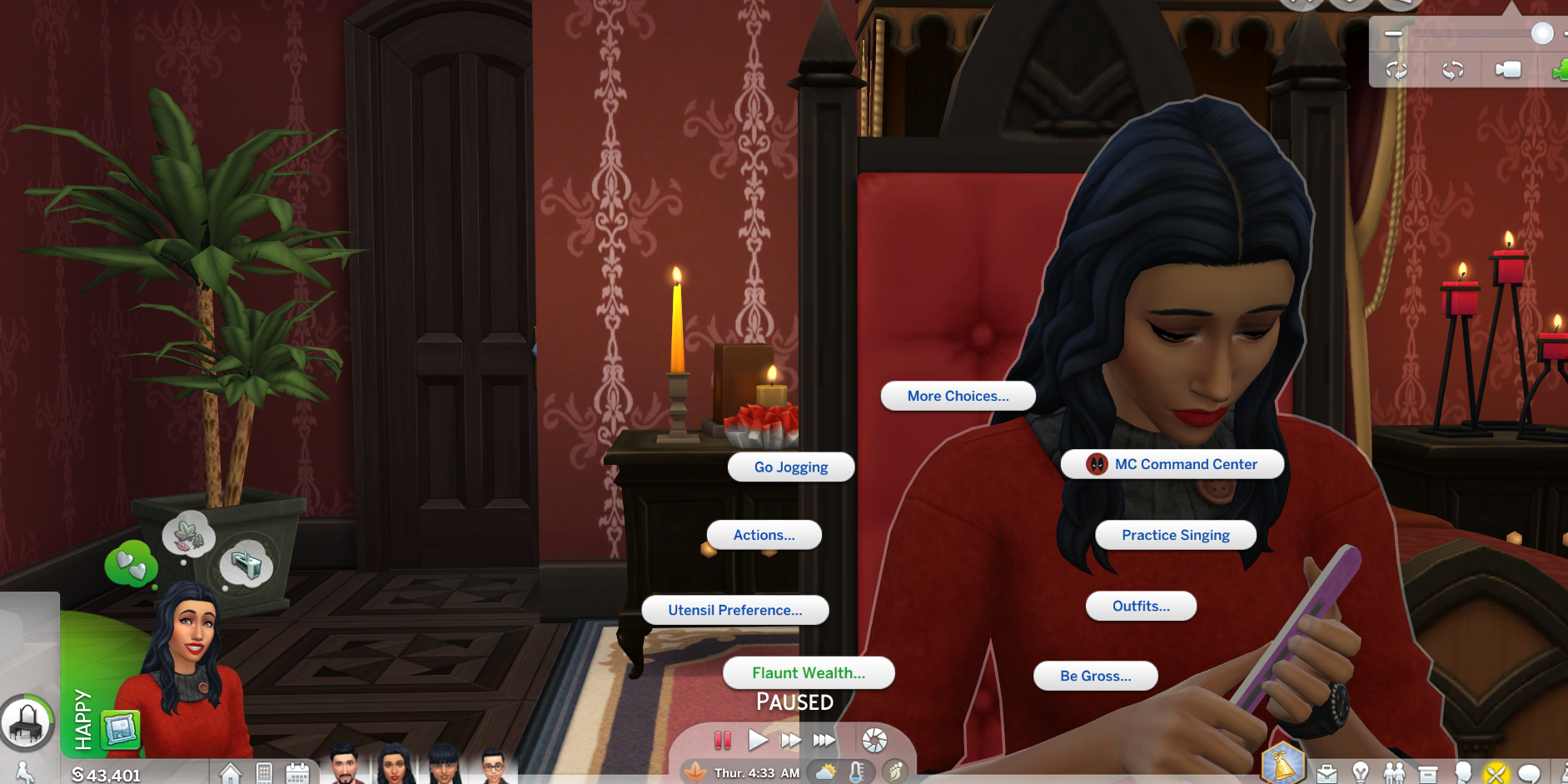 Bella Goth sitting at a vanity, with MC Command Center and Sims 4 UI visible